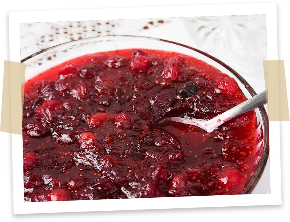 A bowl of cranberry sauce.